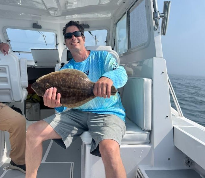 Windy and Foggy Ocean Fluke Trip BY Tim Naples